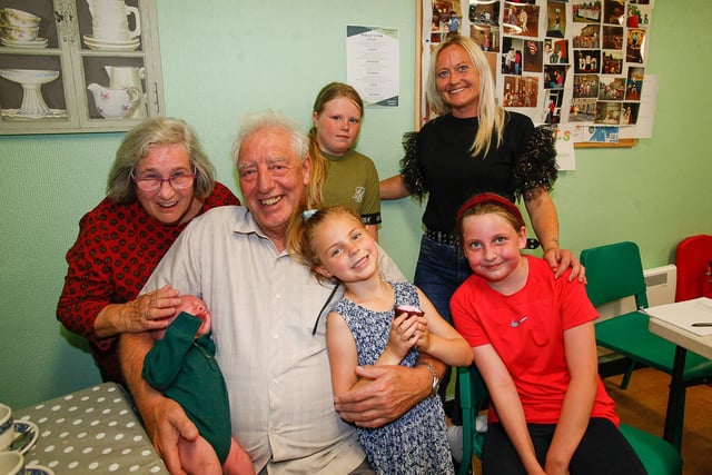 Betty and Jim Cook, who were involved in setting up the community centre, and family