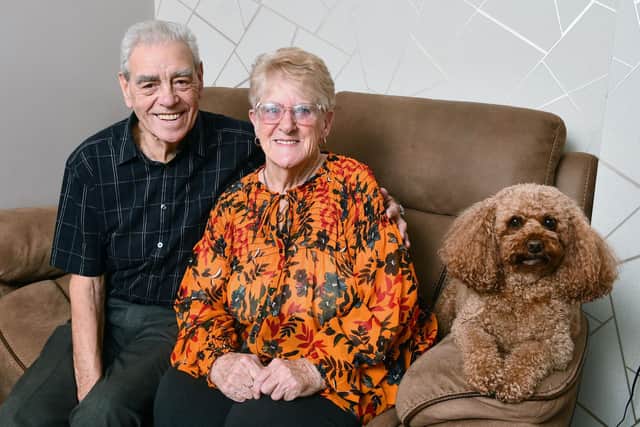 Peter and Marie Ledwidge will cdelebrate 60 years of marriage on February 1. Pictured with Darcey, their nine year old Australian Labradoodle. Pic: Michael Gillen