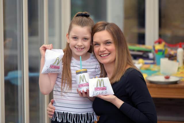 Sarah Winters with daughter Ruby (8)  and her McMummy fakeaway lunch