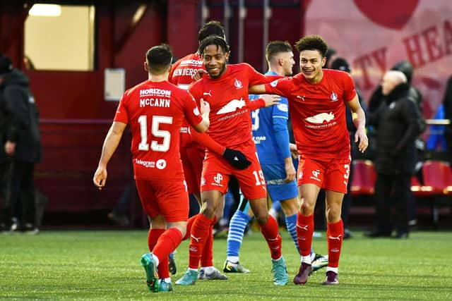 Rumarn Burrell grabbed the winner for Falkirk late on with a brilliant touch and finish