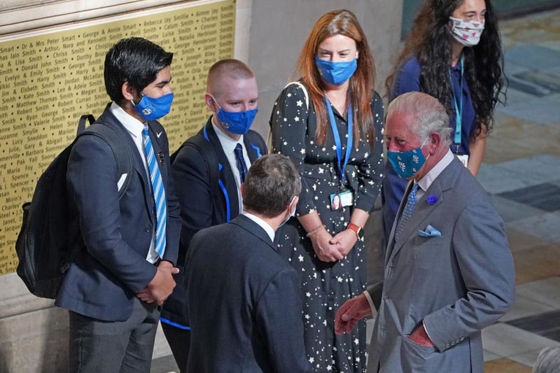 Prince Charles met students from a local school.