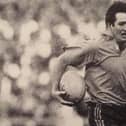 Can you identify the legendary Australian international winger pictured here?