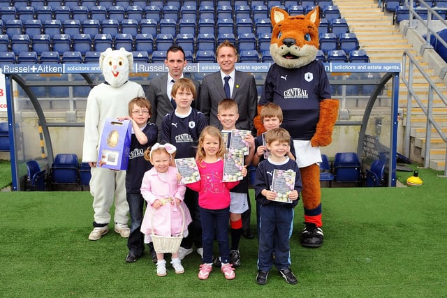 The Easter Bunny and players Marc Stewart and Tam McManus with youngsters at Falkirk Stadium