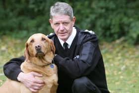 Scottish SPCA Chief Superintendent Mike Flynn with Monty the Golden Labrador