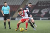 Anton Dowds battles for the ball in midfield (Pictures by Alan Murray)