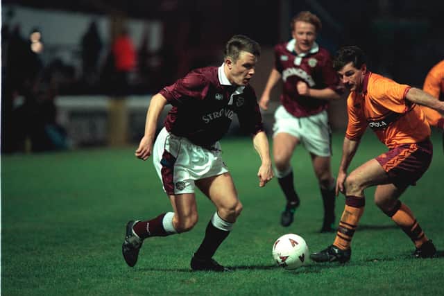 Hagen takes on John Philliben of Motherwell in one of his 27 games at Hearts.
