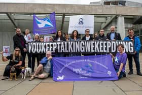 The group Faces And Voices of Recovery hold a protest outside the Scottish Parliament as Scotland's drugs death figures were published on July 28, 2022 in Edinburgh. Photo by Lisa Ferguson.