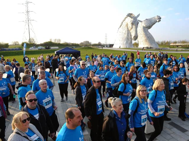 Dozens turned out at The Kelpies in Falkirk for a Walk for Parkinson's event in 2019. Picture: Michael Gillen.