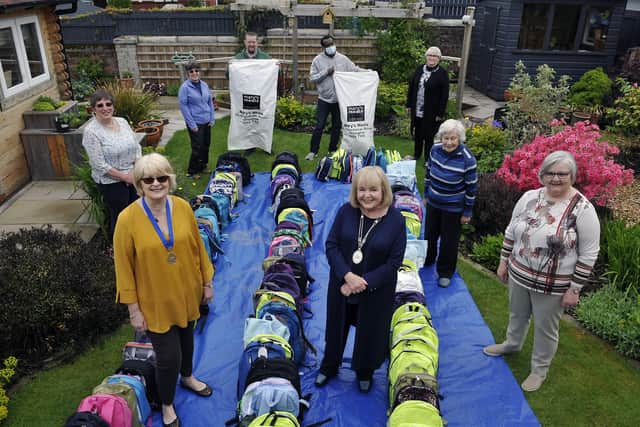 Falkirk Soroptimists hand over backpacks to Mary's Meals