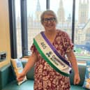 Christine Jardine wears a sash to mark her election as the 465th female MP.