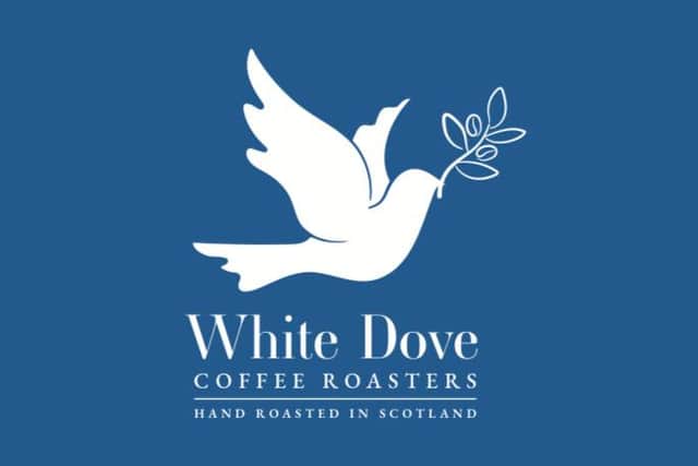The White Dove Coffee Roasters logo.