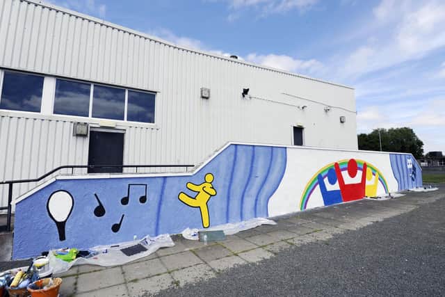 The new mural on the side of Bowhouse Community Centre.