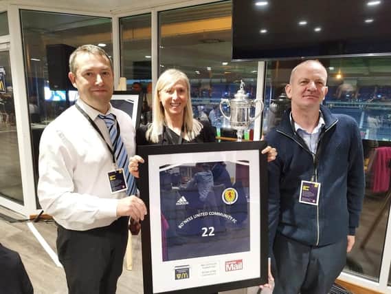 Bo'ness United Community FC representatives who were presented with award