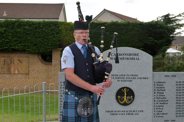 Lone piper Bryan Mackay playing to commemorate the 80th anniversary of the Battle of St Valery.