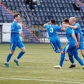 Bo'ness United players celebrate Kieran Mitchell's winning goal, including captain Michael Gemmell, furthest right (Pictures: Scott Louden)