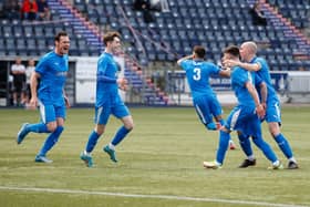 Bo'ness United players celebrate Kieran Mitchell's winning goal, including captain Michael Gemmell, furthest right (Pictures: Scott Louden)
