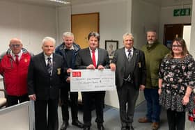 Ancre Somme Association Scotland forces charity donated a cheque for £1,000 to Bainsford War Memorial Association