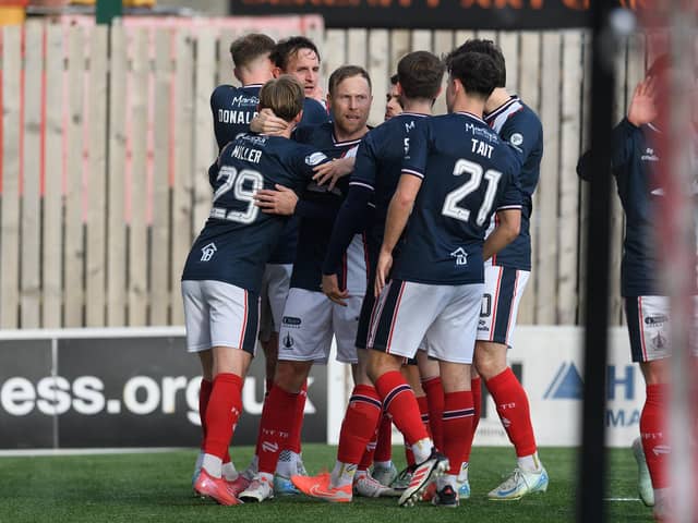Falkirk players celebrate Liam Henderson's goal (Photo: Ian Sneddon)