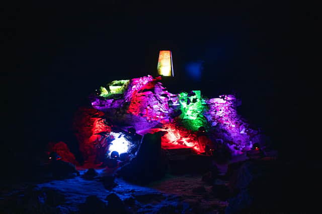 The cairn of Ben Nevis was lit up in various colours by the group. Contributed.