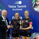 Lara Stirling (middle) and doubles partner Rebecca Plaistow with their trophy (Photo: Table Tennis Scotland)