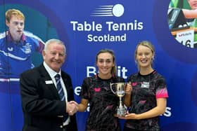 Lara Stirling (middle) and doubles partner Rebecca Plaistow with their trophy (Photo: Table Tennis Scotland)