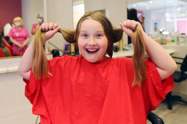 Eva's haircut not only brought a donation of hair to the Little Princess Trust, but also well over £500