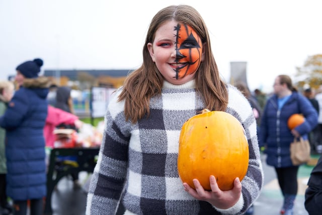 All smiles with some spooky face paint.