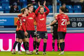 Falkirk manager John McGlynn’s visitors got the better of opposite number Dougie Imrie’s hosts at Cappielow Park in February by 2-0 thanks to first-half goals from Scott Arfield and Ethan Ross, on 19 minutes and 27 respectively. Arfield is pictured celebrating with Falkirk teammates after Ross put them 2-0 up (Photo: Mark Scates/SNS Group)