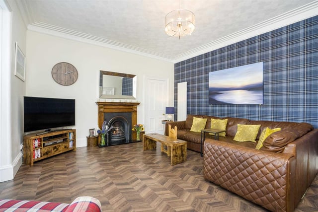The great sized living room is ideal for relaxing in with the family.