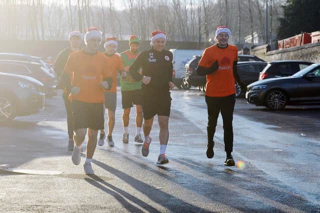 Maggie's Forth valley hosted an Elf Family Fun Run in December and is now seeking volunteers for its 300,000 Steps Challenge. Picture: Michael Gillen.