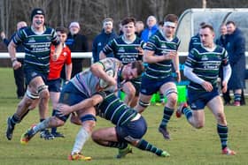 Falkirk’s firsts sealed a fine victory over GHK; here is Alex Geddes being tackled during the win (Photo: Gordon Honeyman)