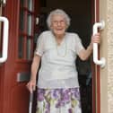 California resident Marion Lowrie celebrated her 100th with family, friends and piper Gordon McMurtrie. Picture: Michael Gillen.