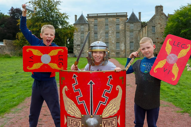Callum, 8, Robbie, 8, and Lachlan, 11 enjoying the Roman themed event.