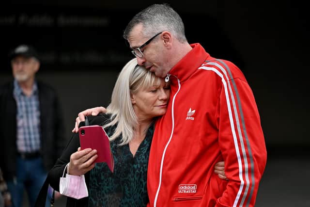 Peter Krykant reacts with Margaret Roach outside the Scottish Parliament during a ceremony to mark International Overdose Awareness Day. Picture: Jeff J Mitchell/Getty Images