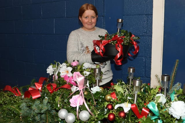 Karris, 12, from Bonnybridge selling holly/floral products she created herself