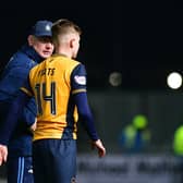 25-11-2023. Picture Michael Gillen. FALKIRK. Falkirk Stadium. Falkirk FC v Formartine United FC. Season 2023 - 2024. The Scottish Gas Men's Scottish Cup 3rd round. John McGlynn checks on Finn Yeats 14 at the end of the game.