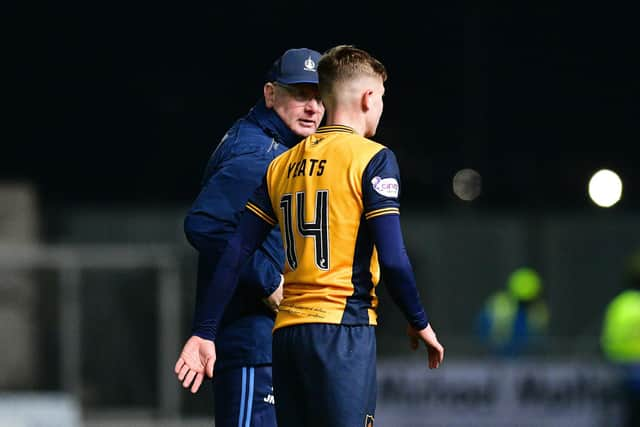 25-11-2023. Picture Michael Gillen. FALKIRK. Falkirk Stadium. Falkirk FC v Formartine United FC. Season 2023 - 2024. The Scottish Gas Men's Scottish Cup 3rd round. John McGlynn checks on Finn Yeats 14 at the end of the game.