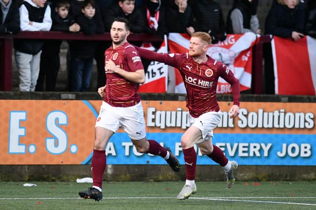 Euan O'Reilly celebrates with goalscorer Thomas Orr after his first half strike (Pics: Michael Gillen)