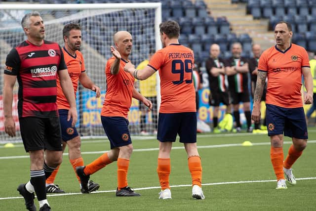 2024 Lava Cup winners Uniao Desportiva pictured celebrating scoring a goal