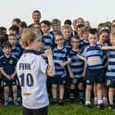 Rory Lawson with a group of young Falkirk RC members, who sent a message to former player Finn Russell ahead of the Scots' World Cup kick-off on Sunday (Photo: Euan Cherry)