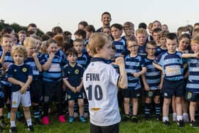 Rory Lawson with a group of young Falkirk RC members, who sent a message to former player Finn Russell ahead of the Scots' World Cup kick-off on Sunday (Photo: Euan Cherry)