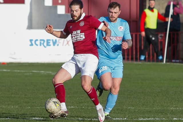 Linlithgow Rose and Camelon Juniors vying for possession on Saturday (Photo: Scott Louden)