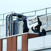 Four protesters made their way to the roof of the Ineos gas power plant. Pic: Michael Gillen