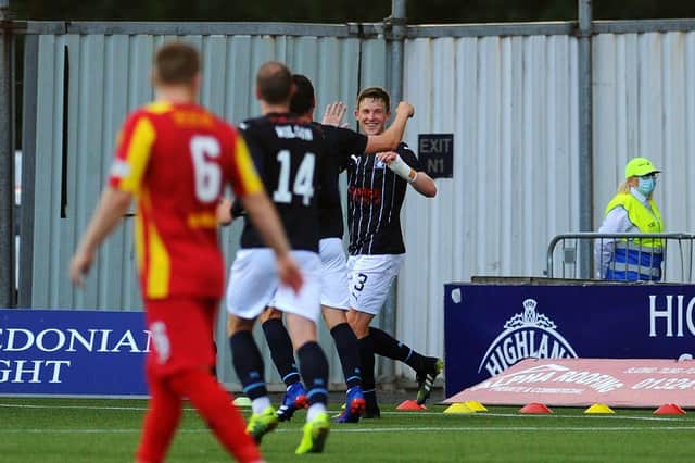 Paul Dixon celebrates scoring in the 5-1 League Cup win over Albion Rovers on July 13 (Pic by Michael Gillen)