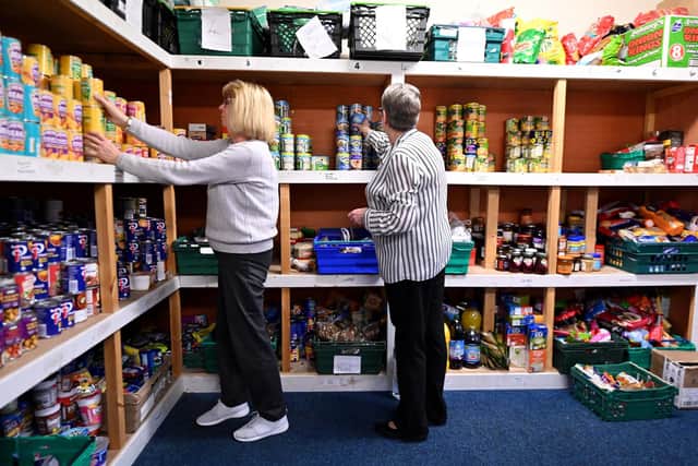 ​Food-bank volunteers help provide a lifeline for people struggling with the cost-of-living crisis