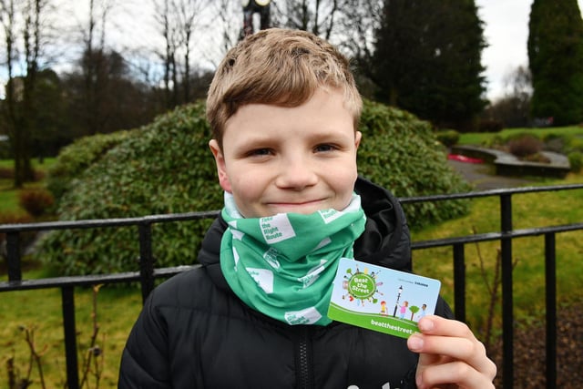 Eleven-year-old Jacob Stuart of St Joseph's shows off his Beat the Street card.