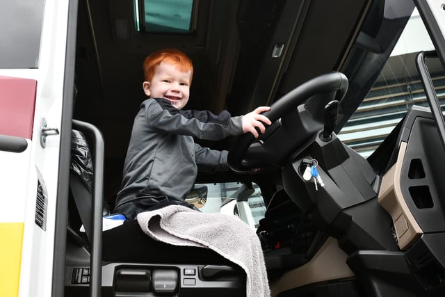 Noah Anderson 5, from Plean, looks ready to start a convoy as he climbs aboard a John Mitchell Haulage truck just like his grandfather