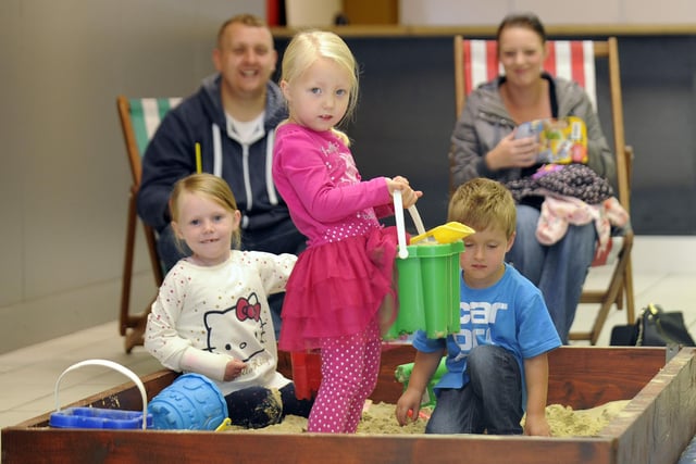 Chloe Kemp and Caitlin Kemp enjoy beach fun at Howgate with Nathan Trotter.