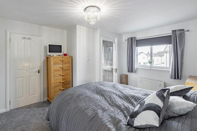 The master is well-appointed with built-in wardrobes and the added bonus of a stylish en-suite shower room.