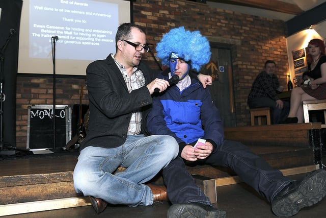 Double raffle winner Craig Stirling of Palmaris with Ewen Cameron.